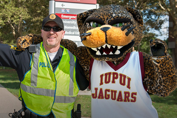 Jaguar Mascot posing with IU police